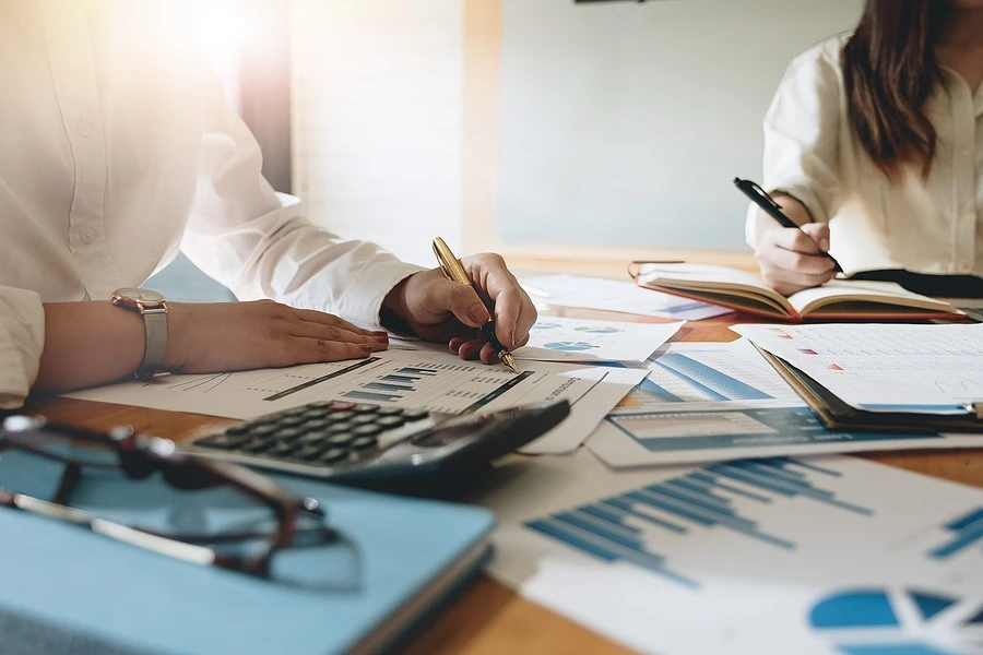 Business owner reviewing finance options and coverage documents