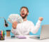Person working on laptop with dollar signs and Money Makers